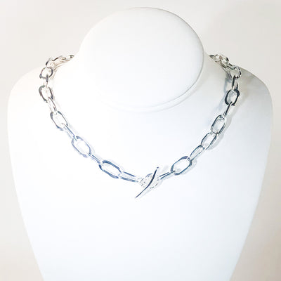 Sterling Junior Tow Truck Necklace by Judie Raiford on mannequin bust