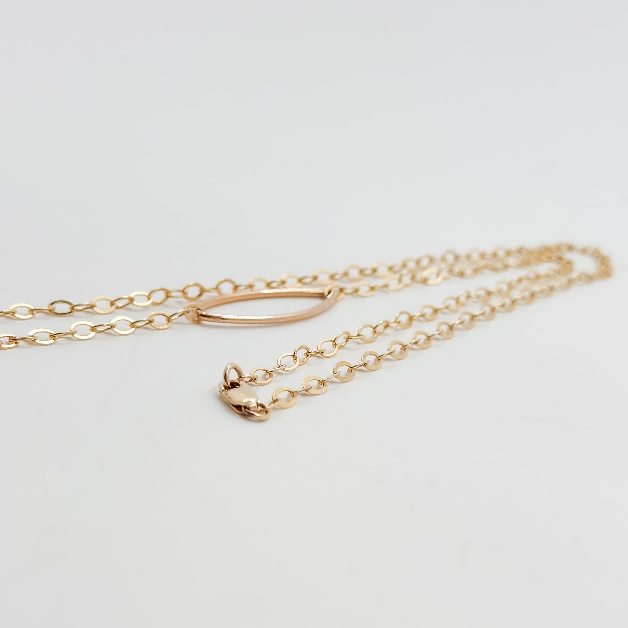 Long leaf lariat with white pearl necklace