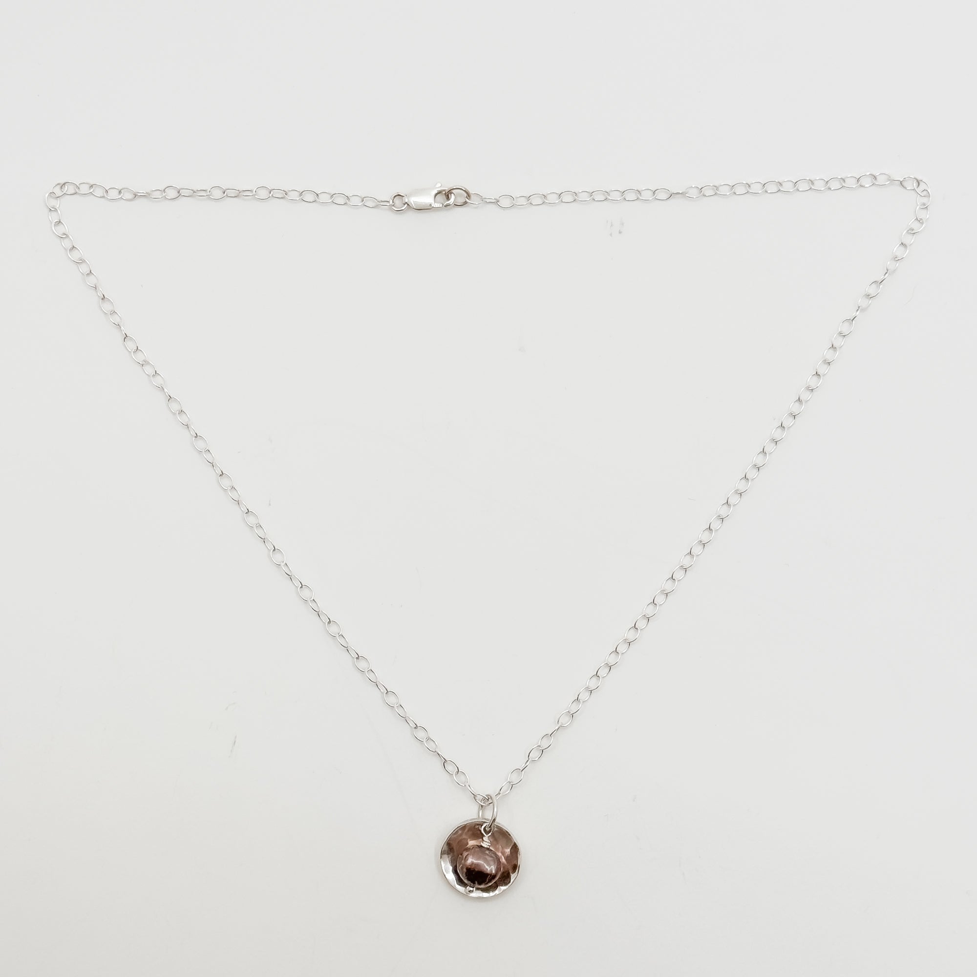 BP Oyster necklace with peacock pearl