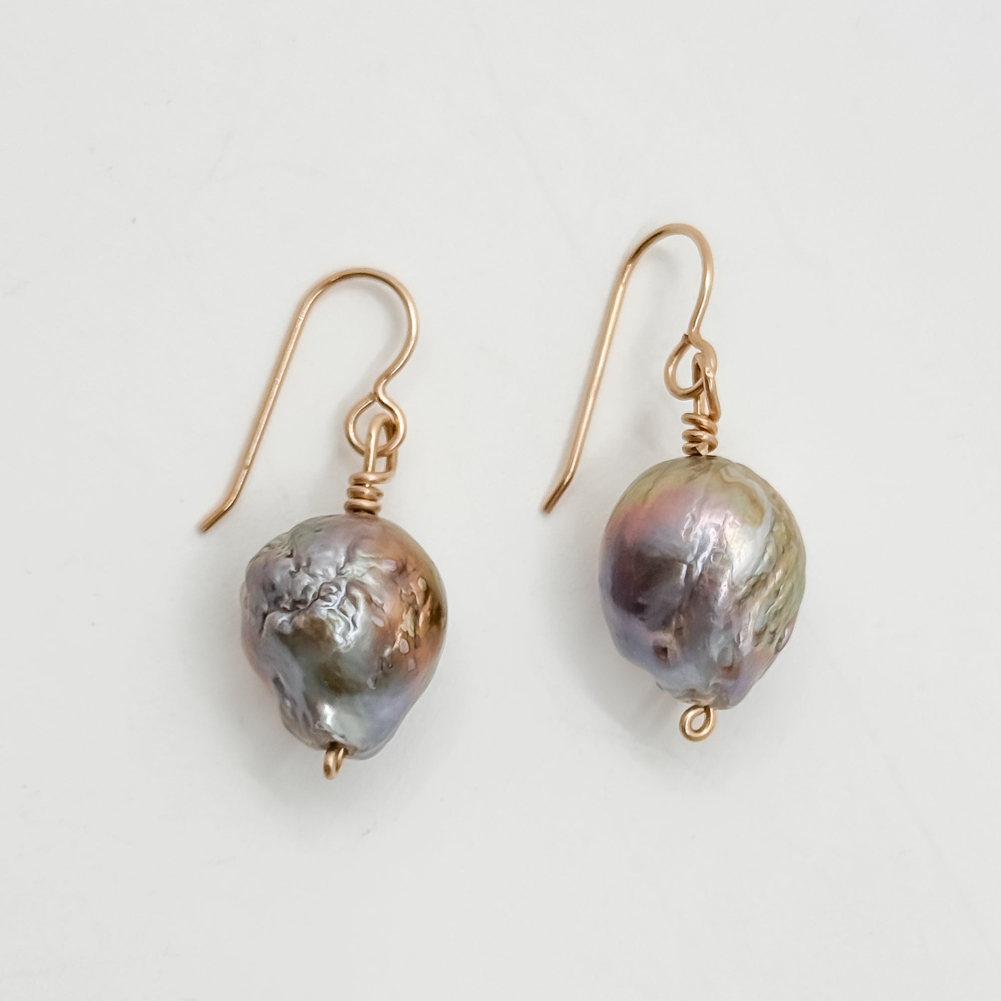 Single large Peacock Baroque pearl earrings