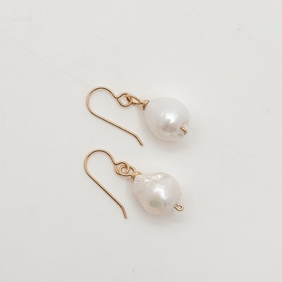 Single Large white Baroque pearl earrings