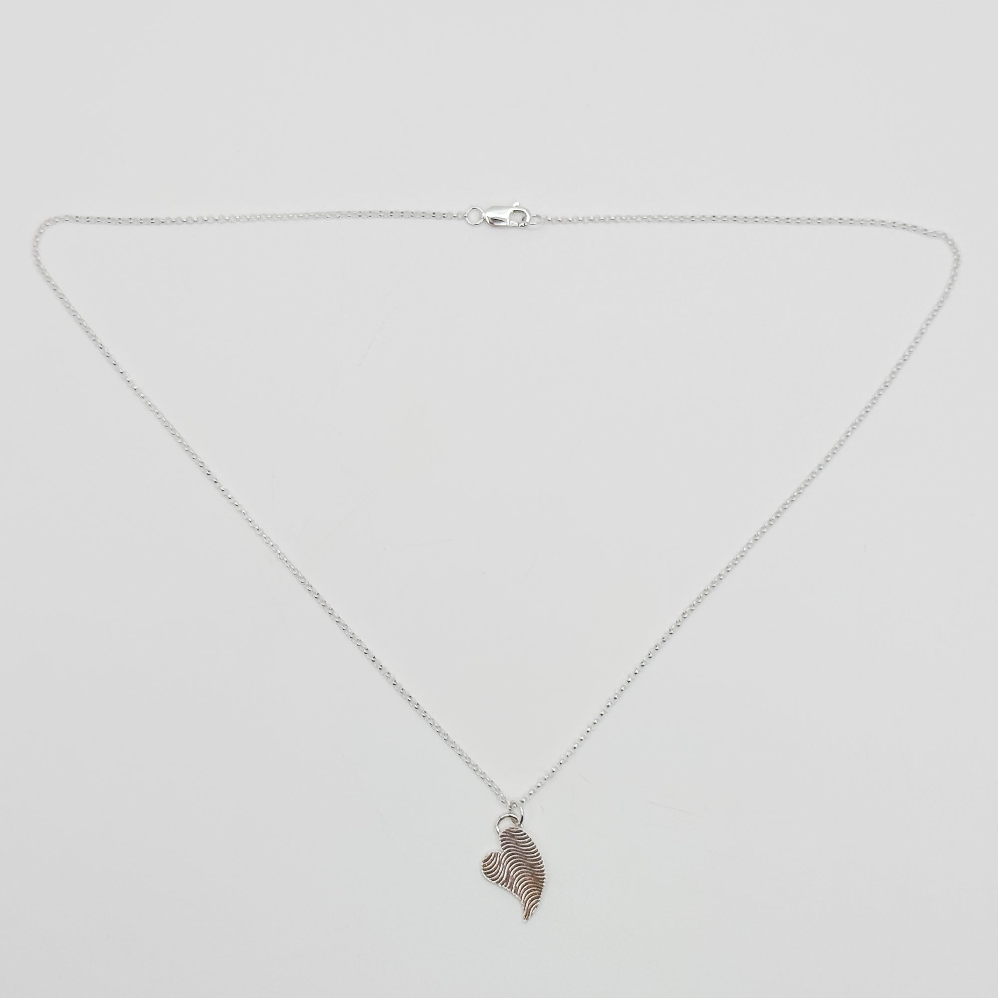 Tipped End Heart with wave pattern necklace