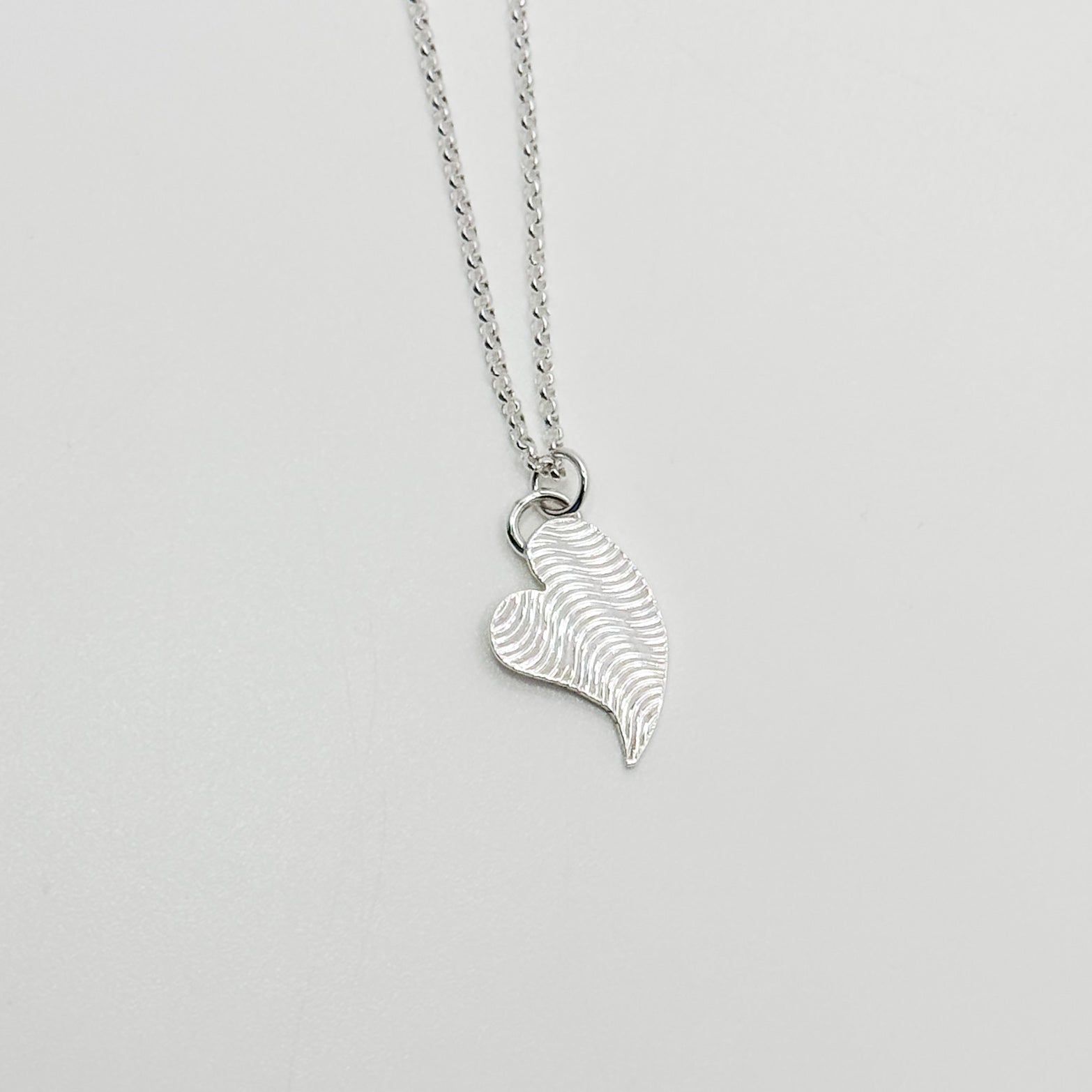 Tipped End Heart with wave pattern necklace