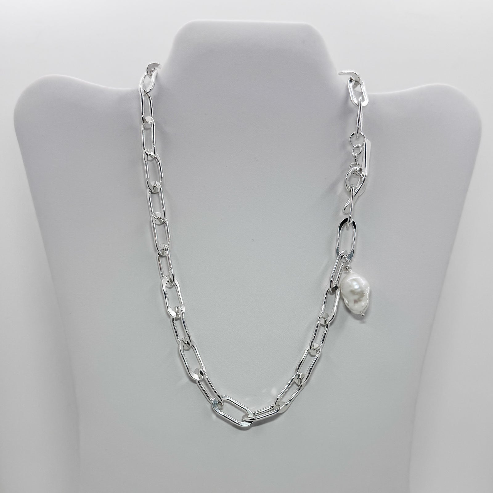 Tow Truck Jr with baroque pearl necklace