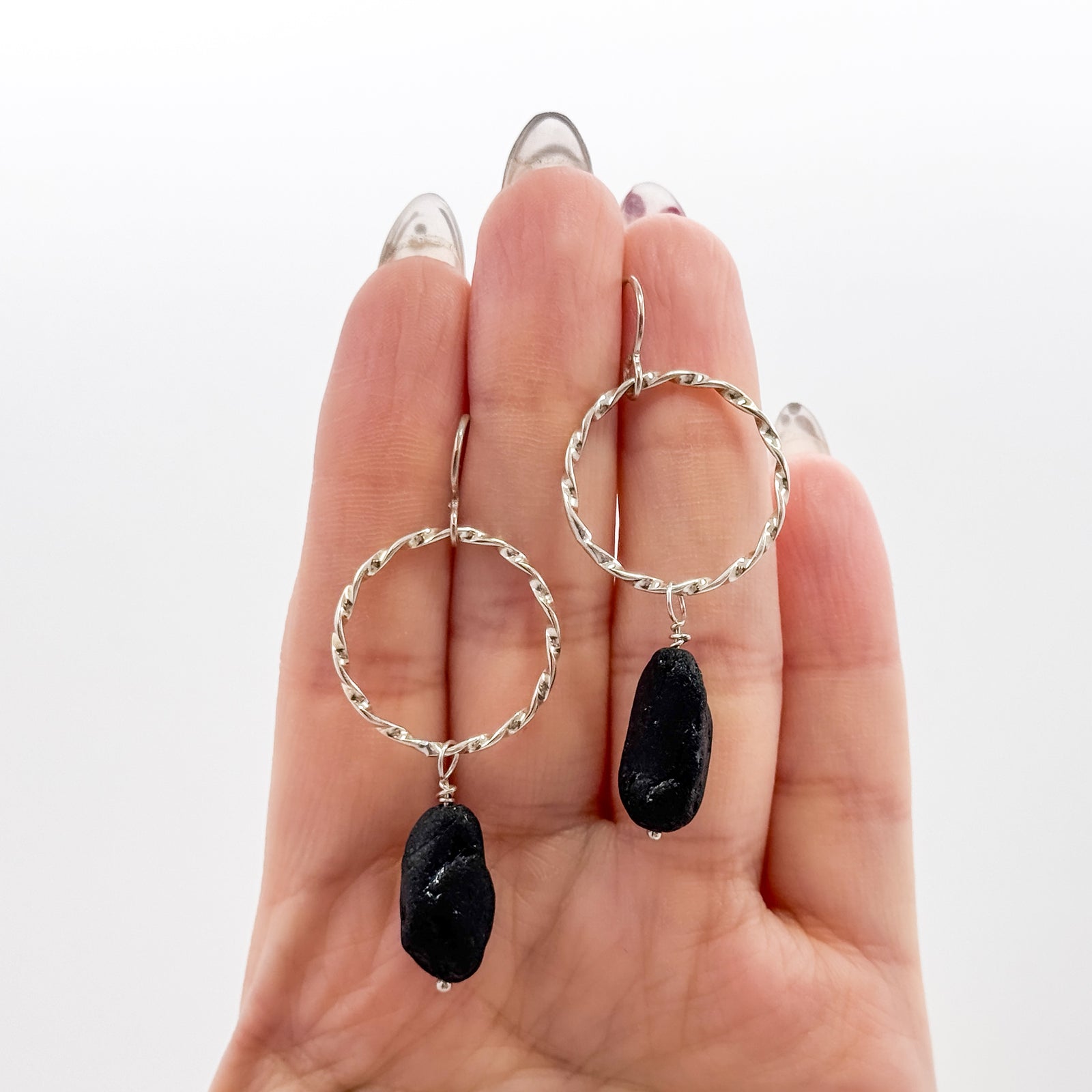 Twisted circle drop earrings with black tourmaline