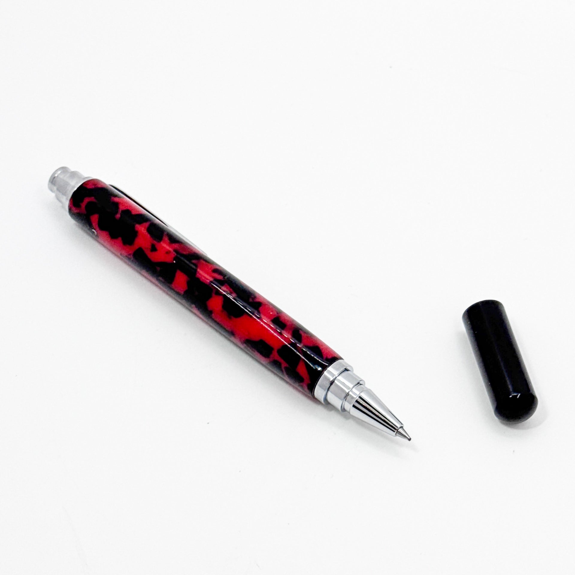 Red and black rollerball pen