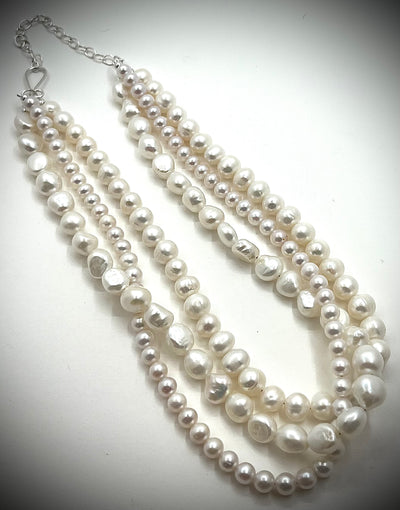 Triple Strand White Pearls on Black Silk Necklace