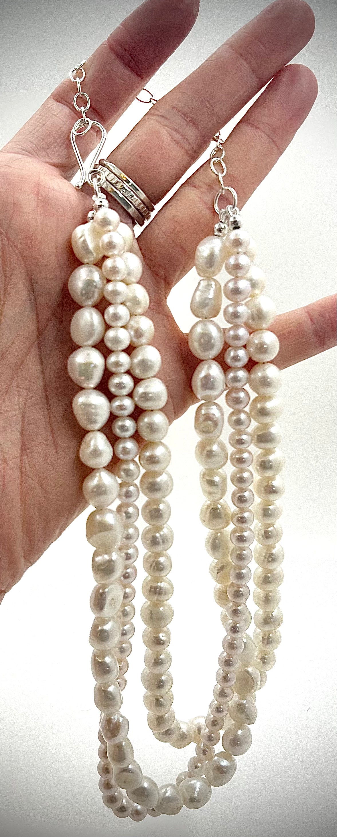 Triple Strand White Pearls on Black Silk Necklace