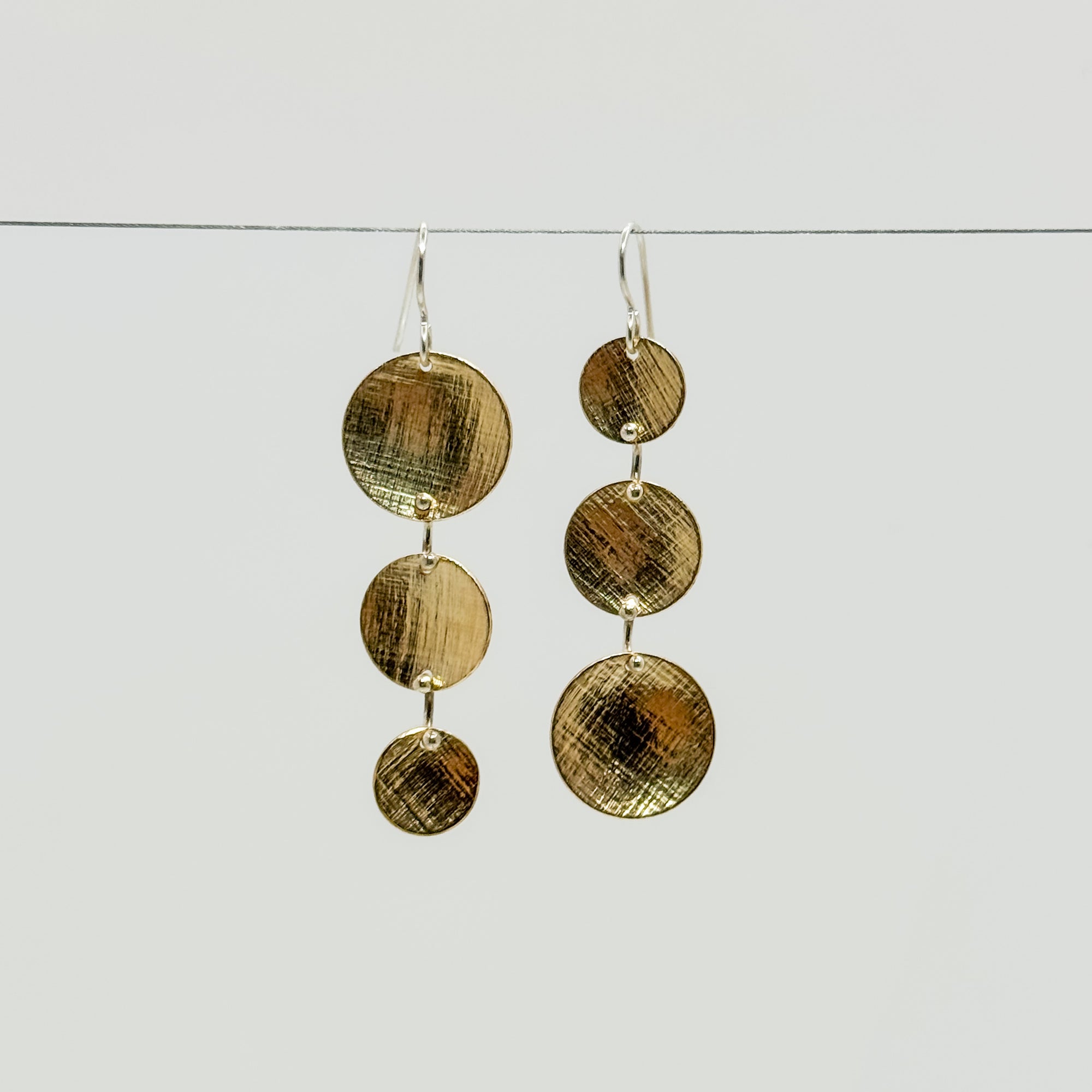 Rush Hour earrings with papyrus texture