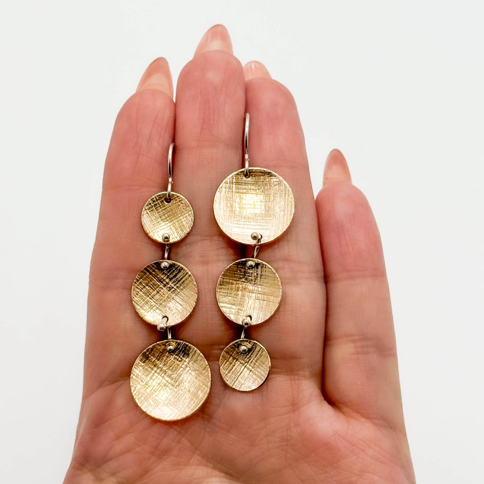 Rush Hour earrings with papyrus texture