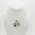 Domed spiral pendant with abalone necklace
