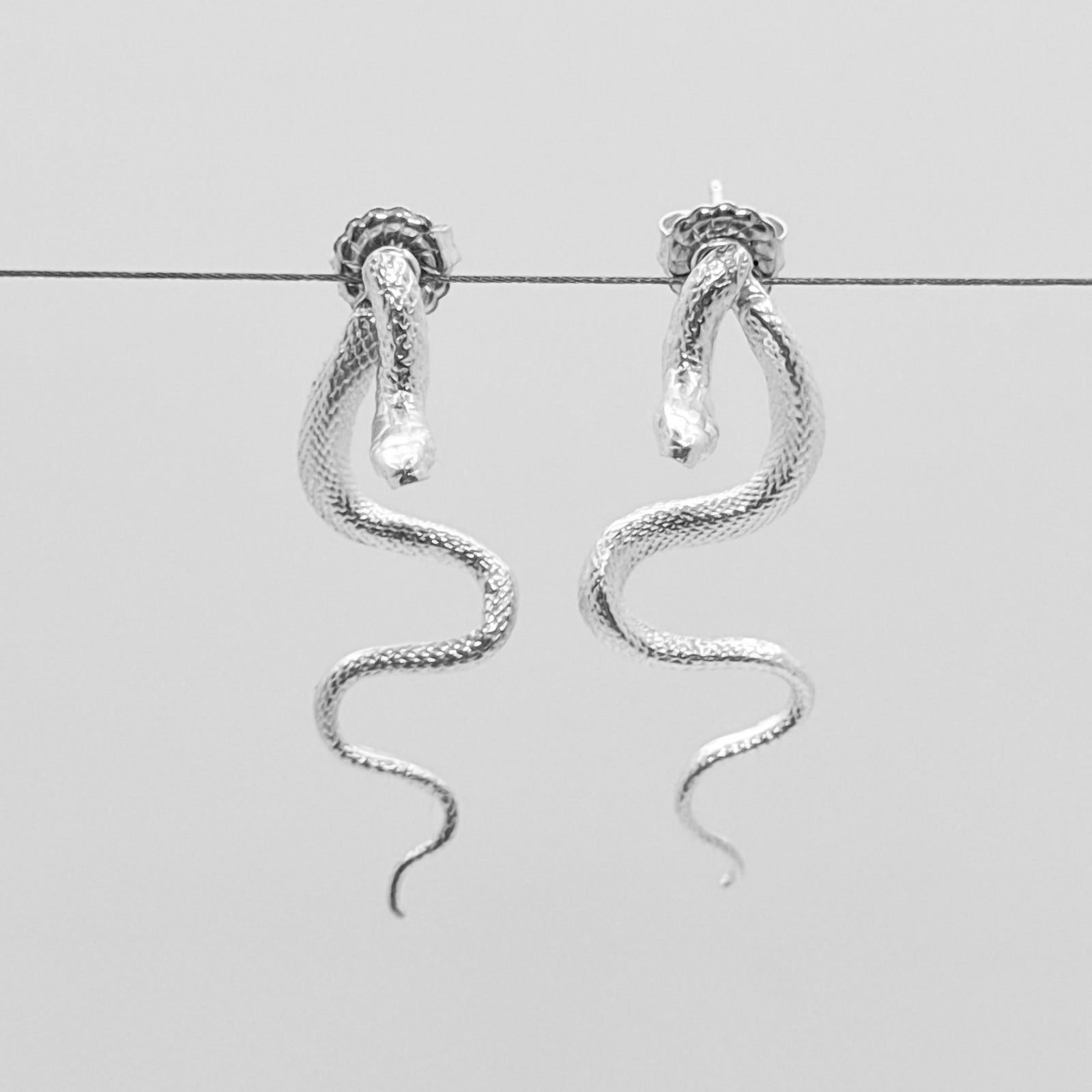 Medium snake earrings