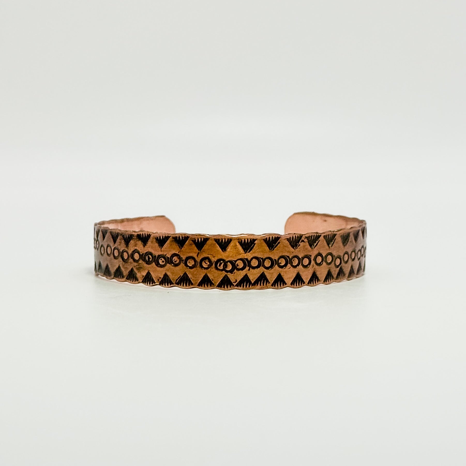 Stamped copper cuff