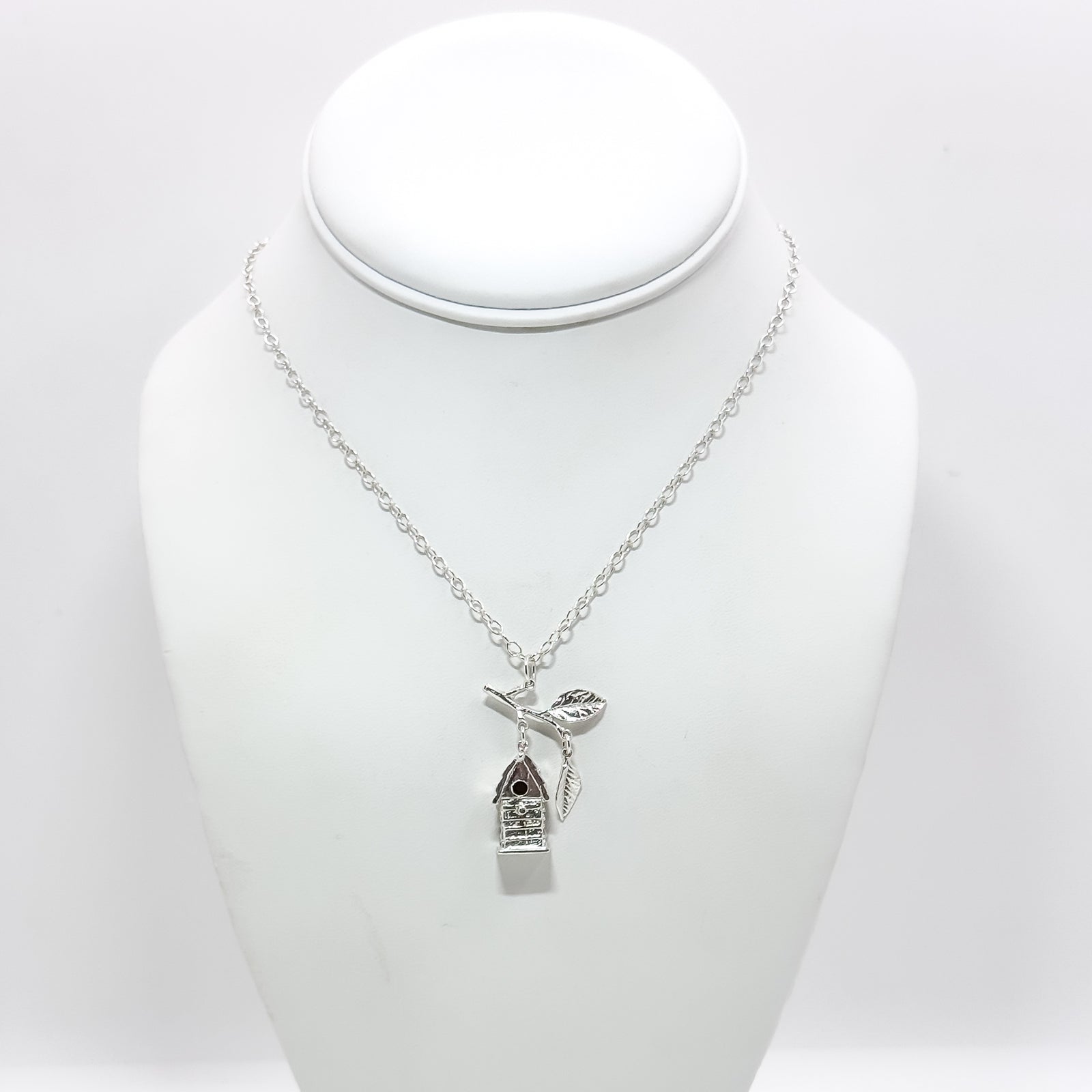 Birdhouse pendant with branch