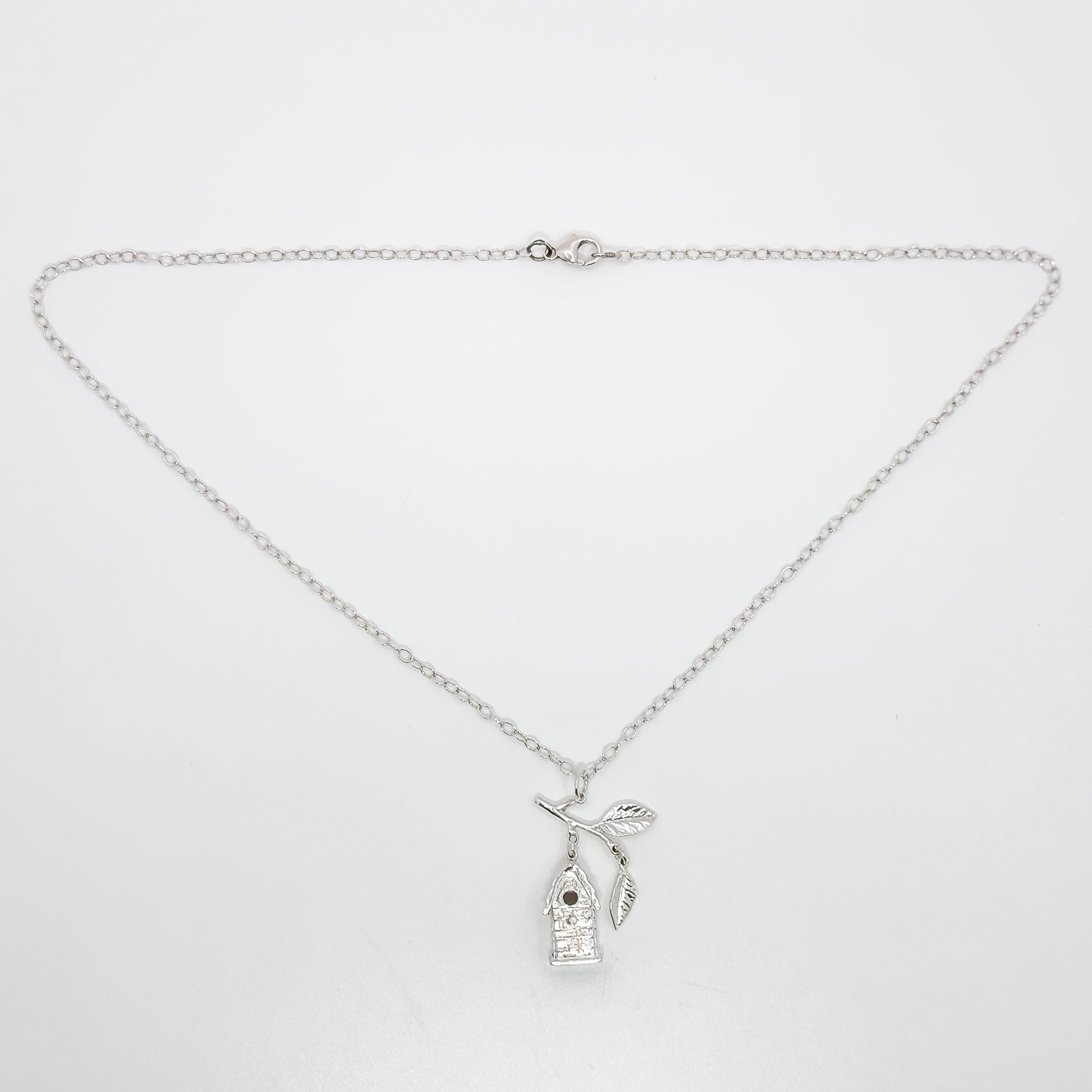 Birdhouse pendant with branch