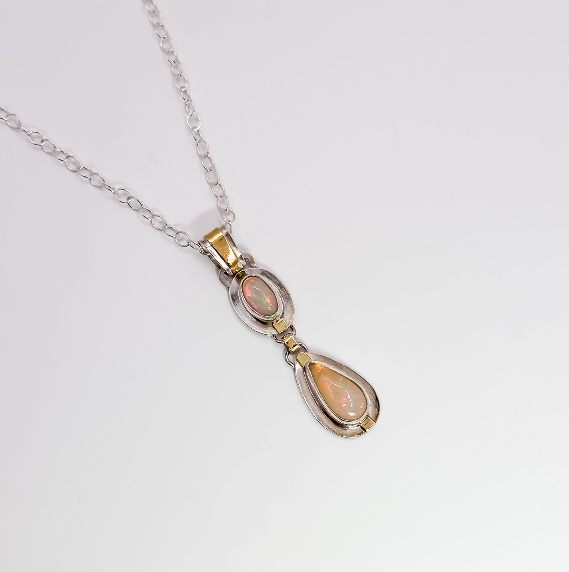 18k pendant with oval & teardrop opal