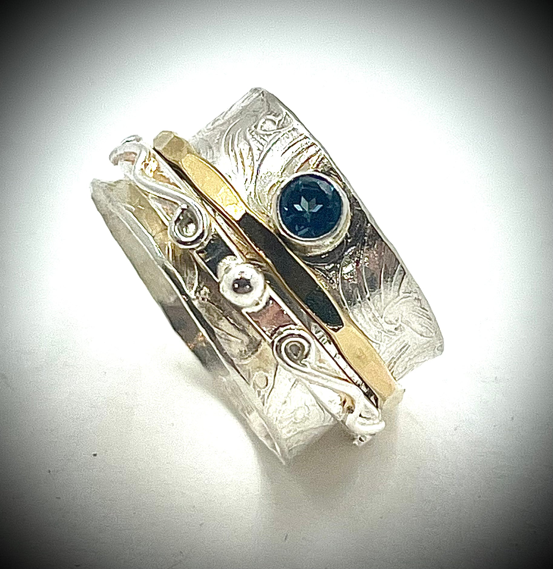 Silver and Gold Twiddle Ring with London Blue Topaz