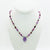 Amethyst, garnet and aqua accented beaded necklace