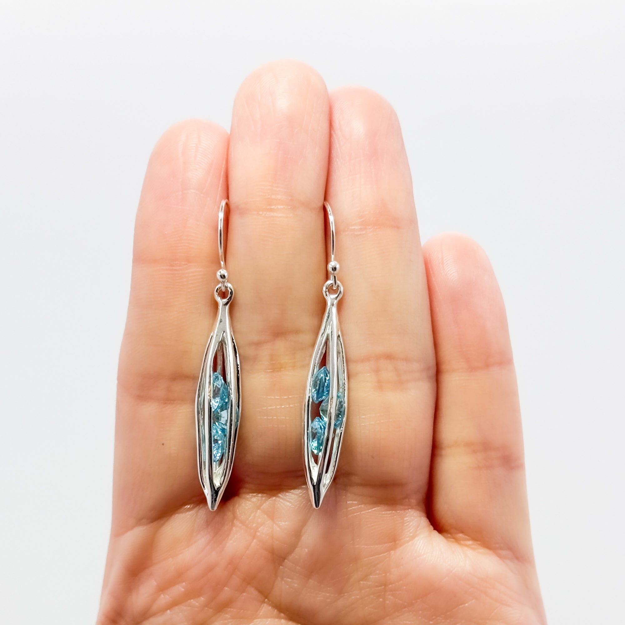 Small Caged Earrings with trapped Aqua CZ