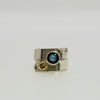 overlap ring with faceted blue topaz