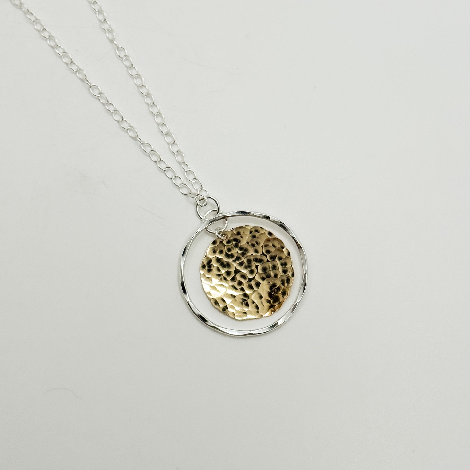 Disk in Orbit necklace