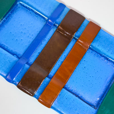 Turquoise tray with green, blue, brown, rust stripes