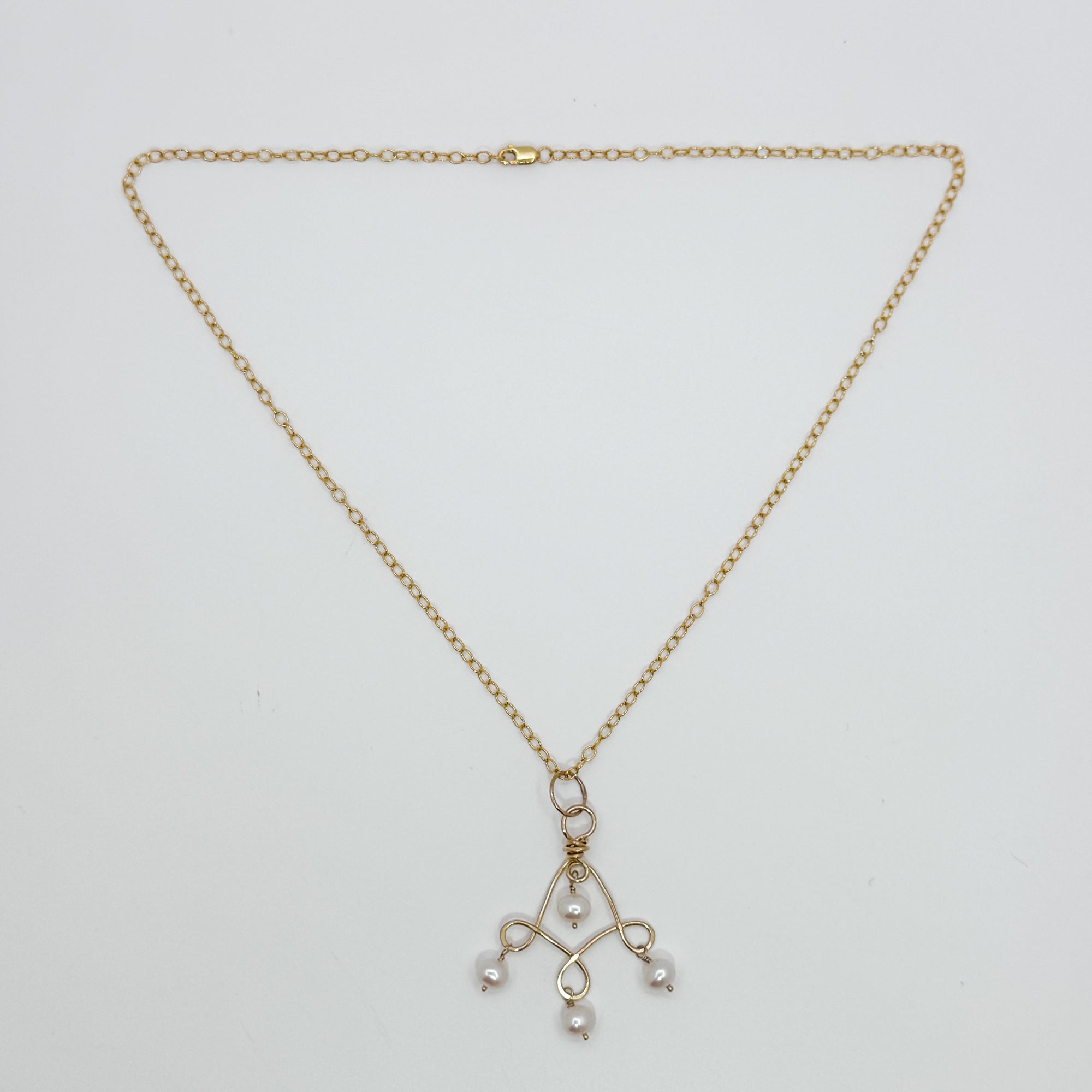 Twizzle Neck with pearl necklace