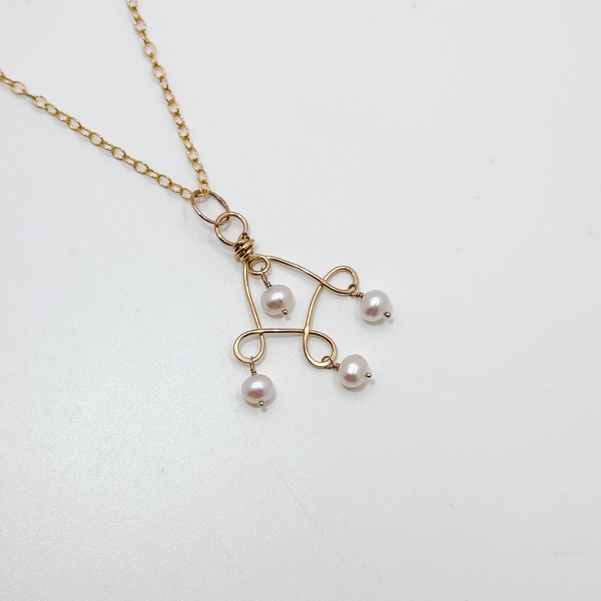 Twizzle Neck with pearl necklace