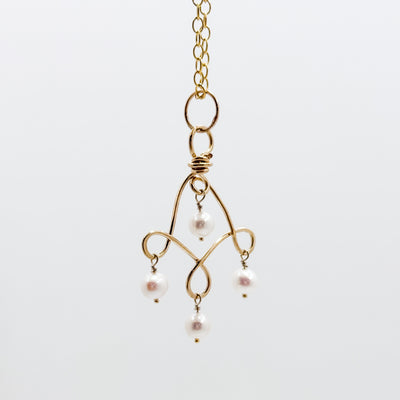 Twizzle Neck with pearl necklace