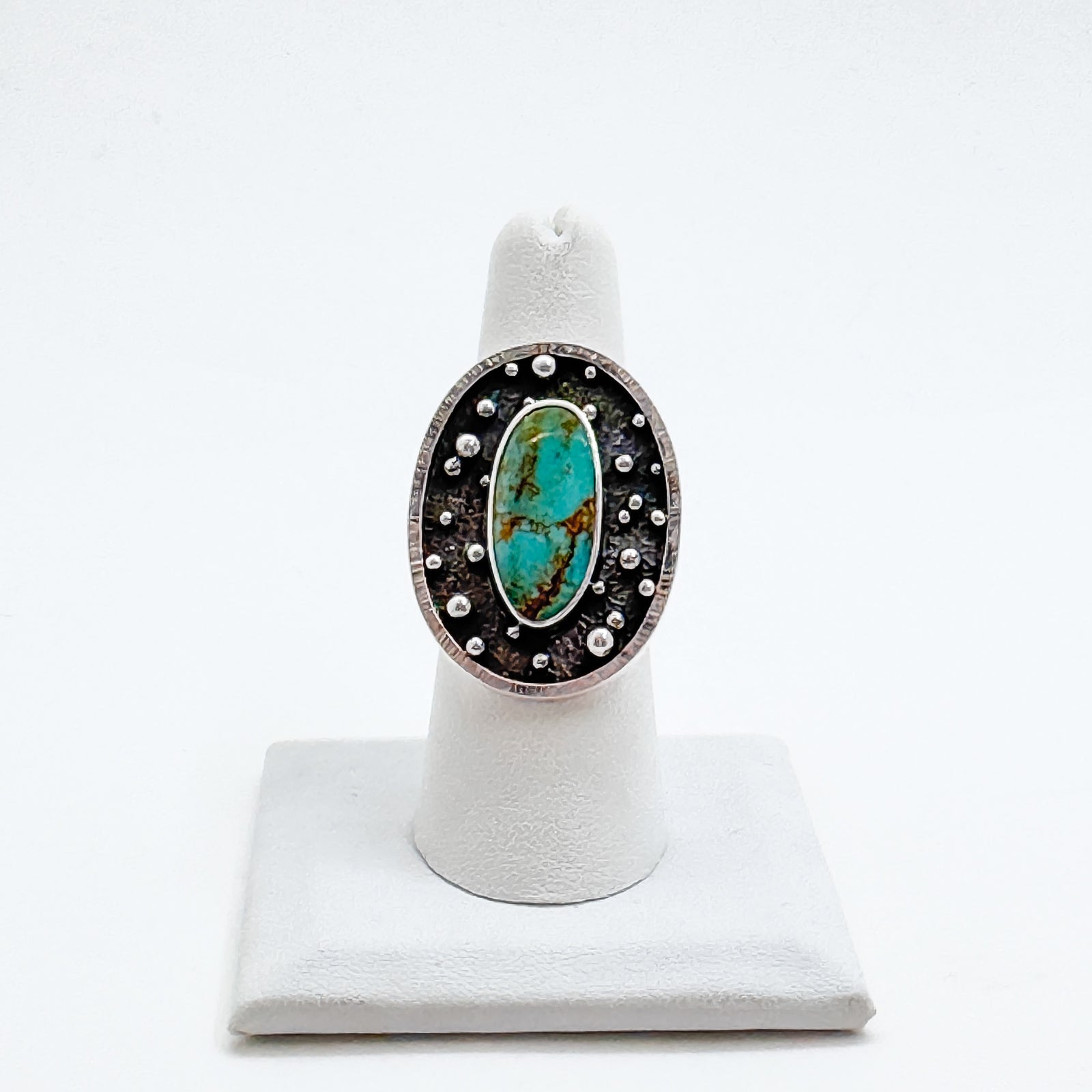 Orbit ring with kingman turquoise