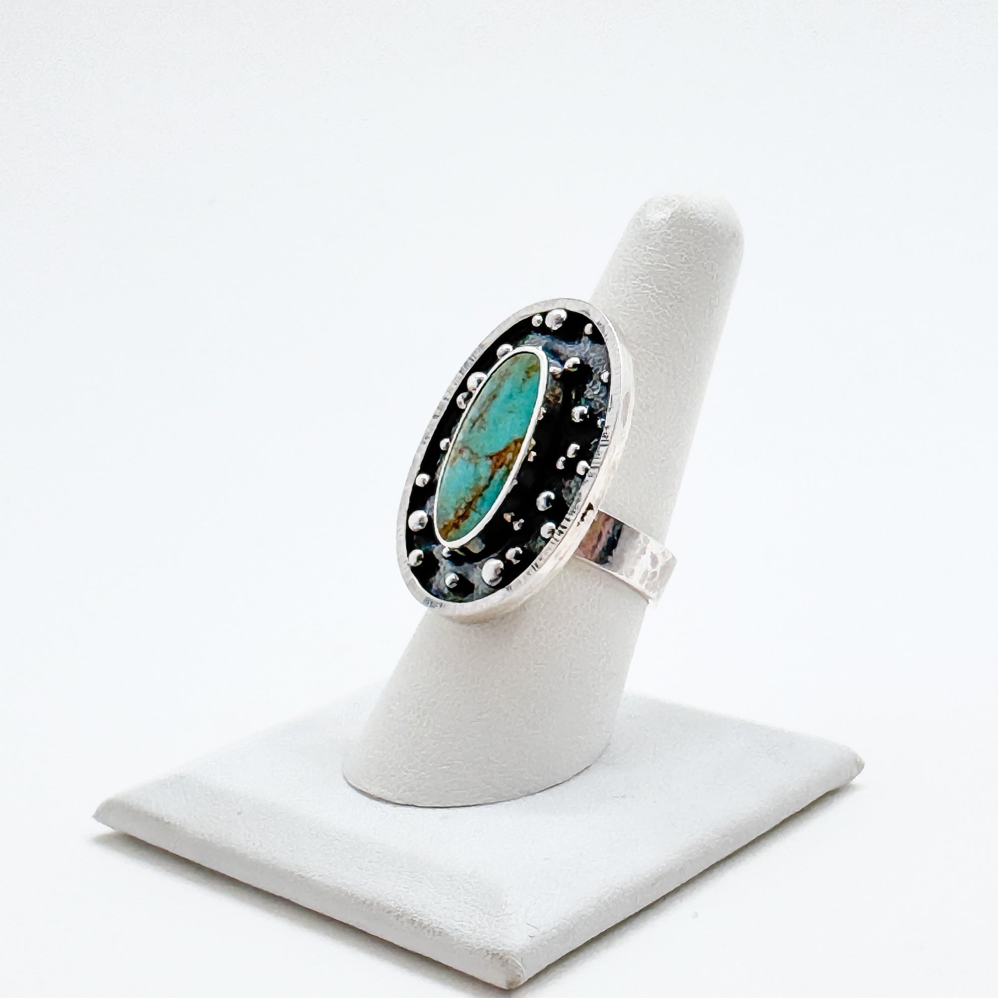 Orbit ring with kingman turquoise