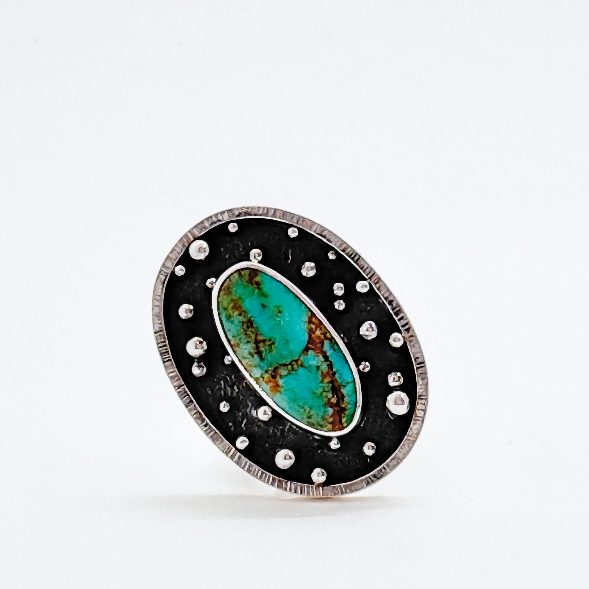 Orbit ring with kingman turquoise