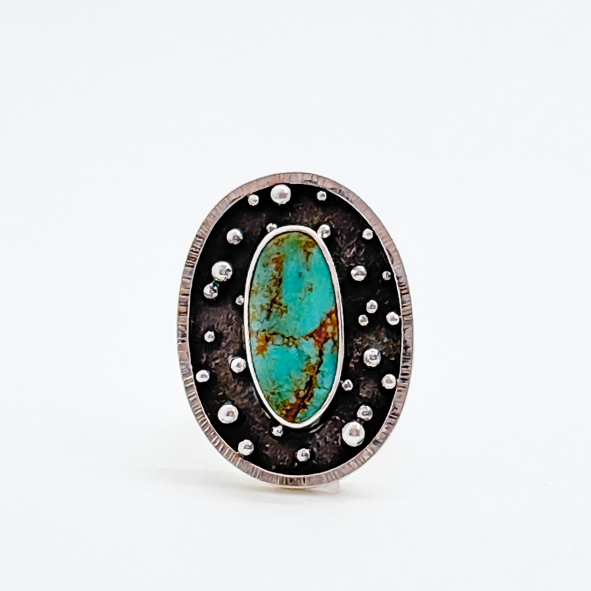 Orbit ring with kingman turquoise