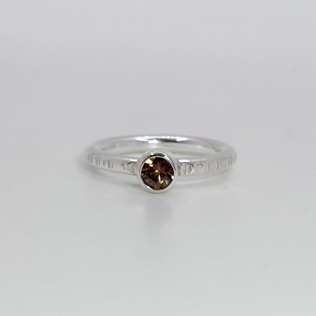 Boiler chip ring with root beer zircon