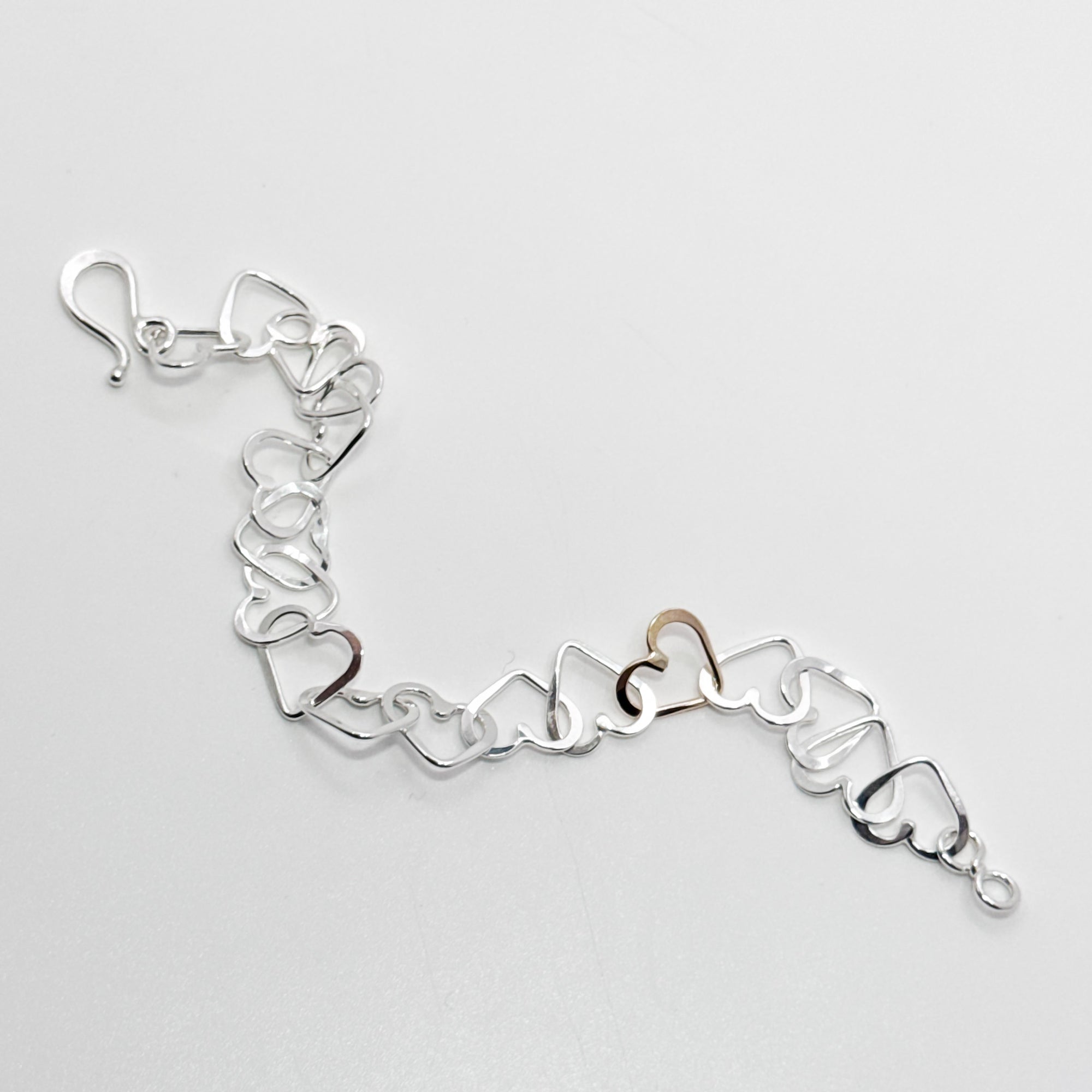 Mini Heart bracelet with hidden gold heart