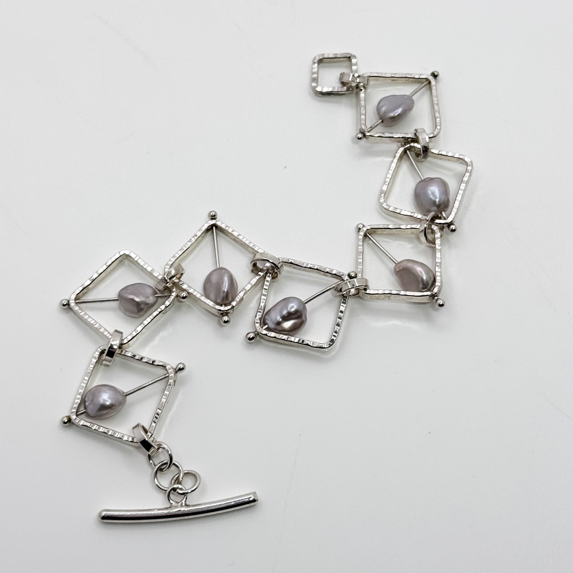 Not naught square grey baroque pearl bracelet
