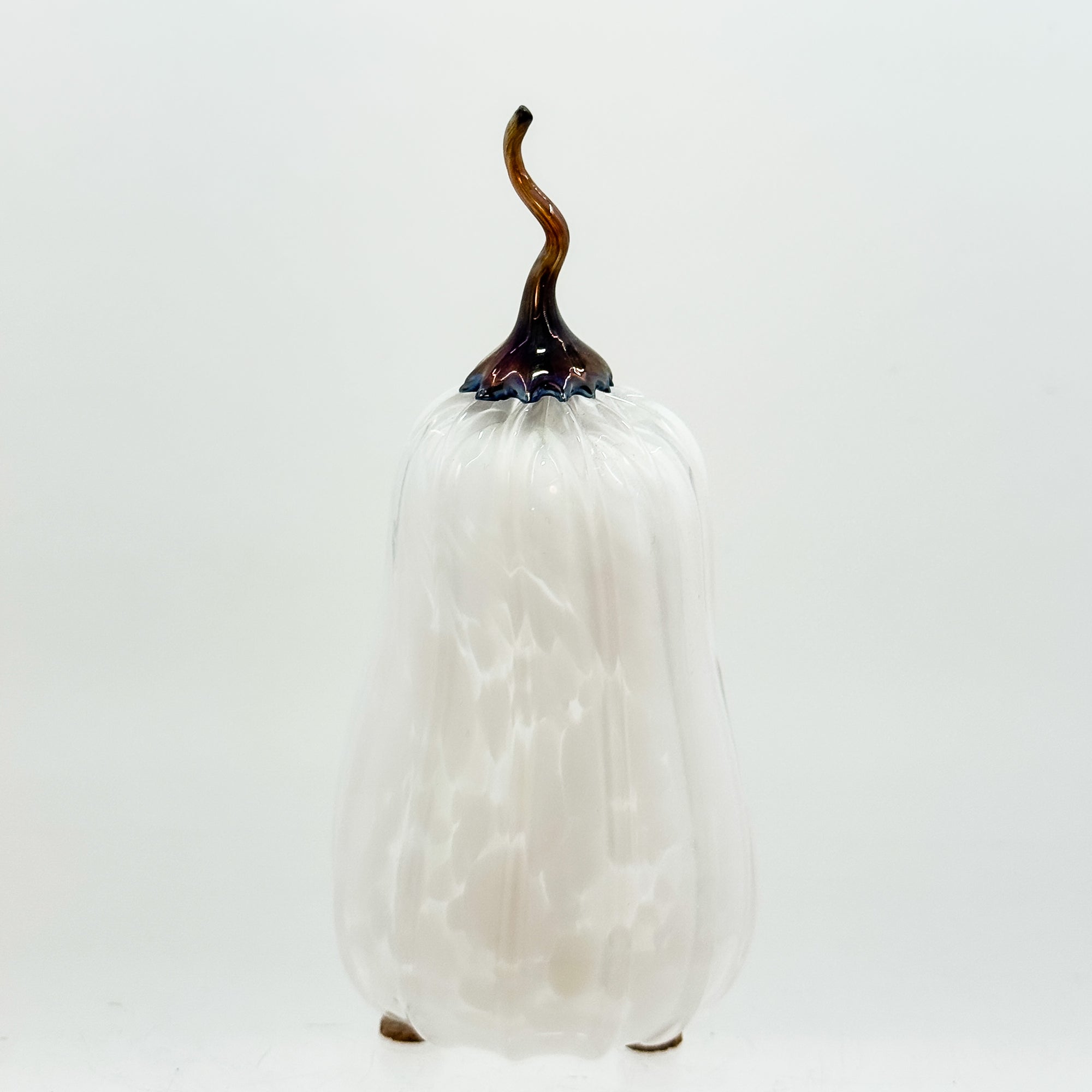 Small tall pumpkin in white