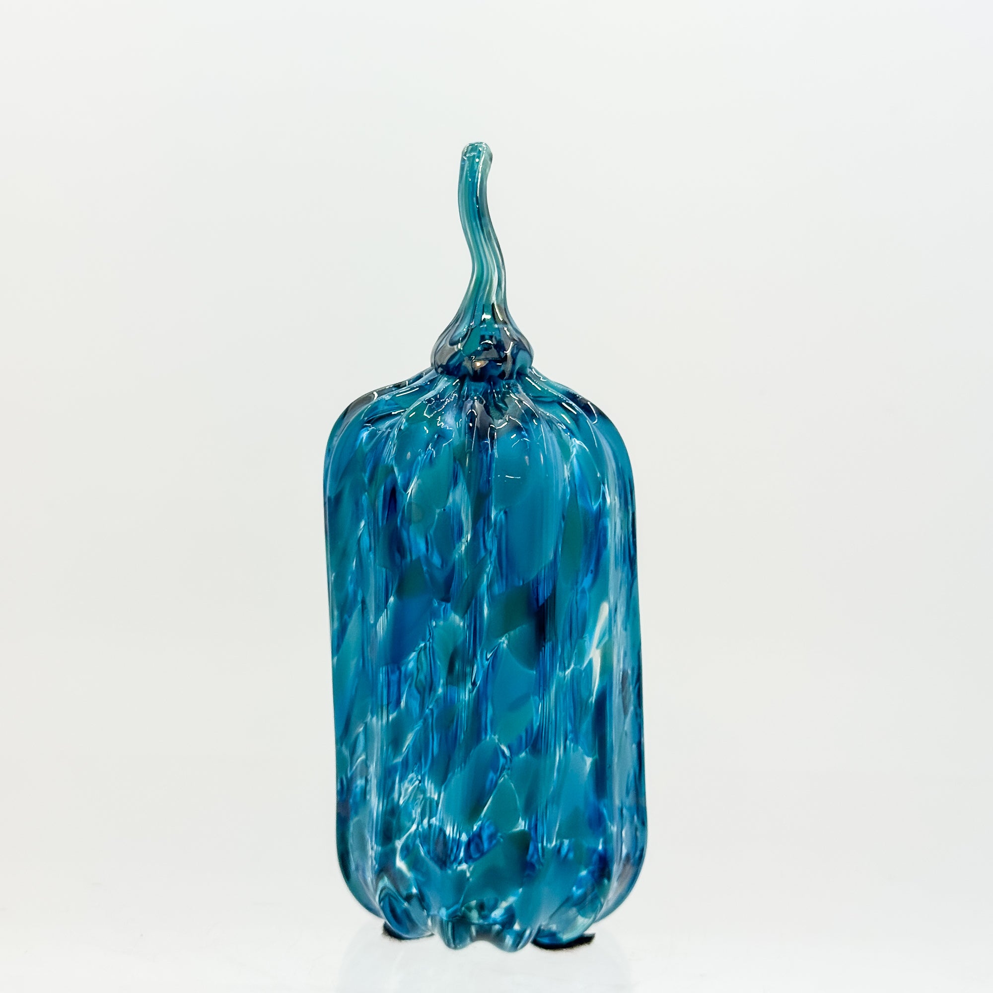 Small tall pumpkin in aqua
