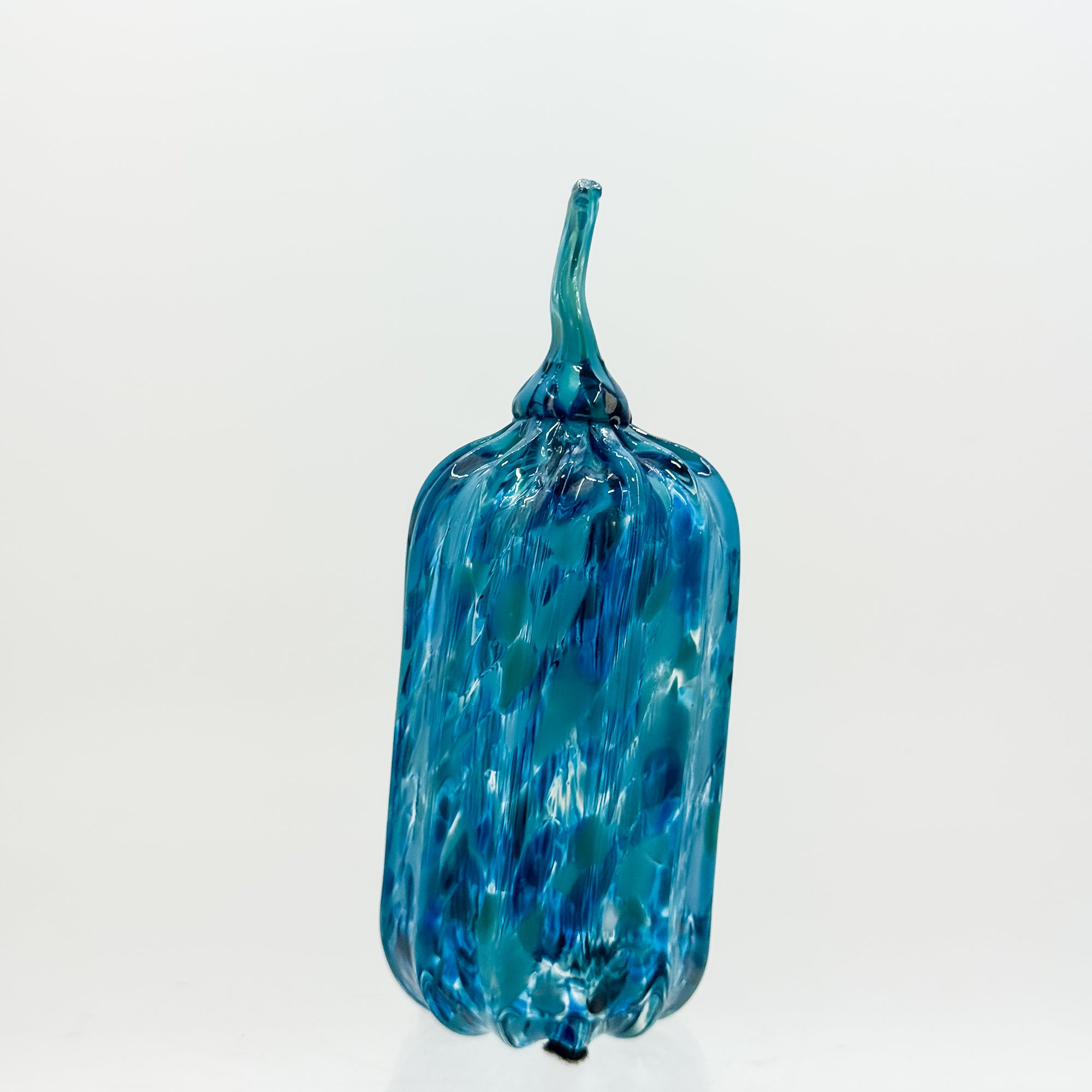 Small tall pumpkin in aqua