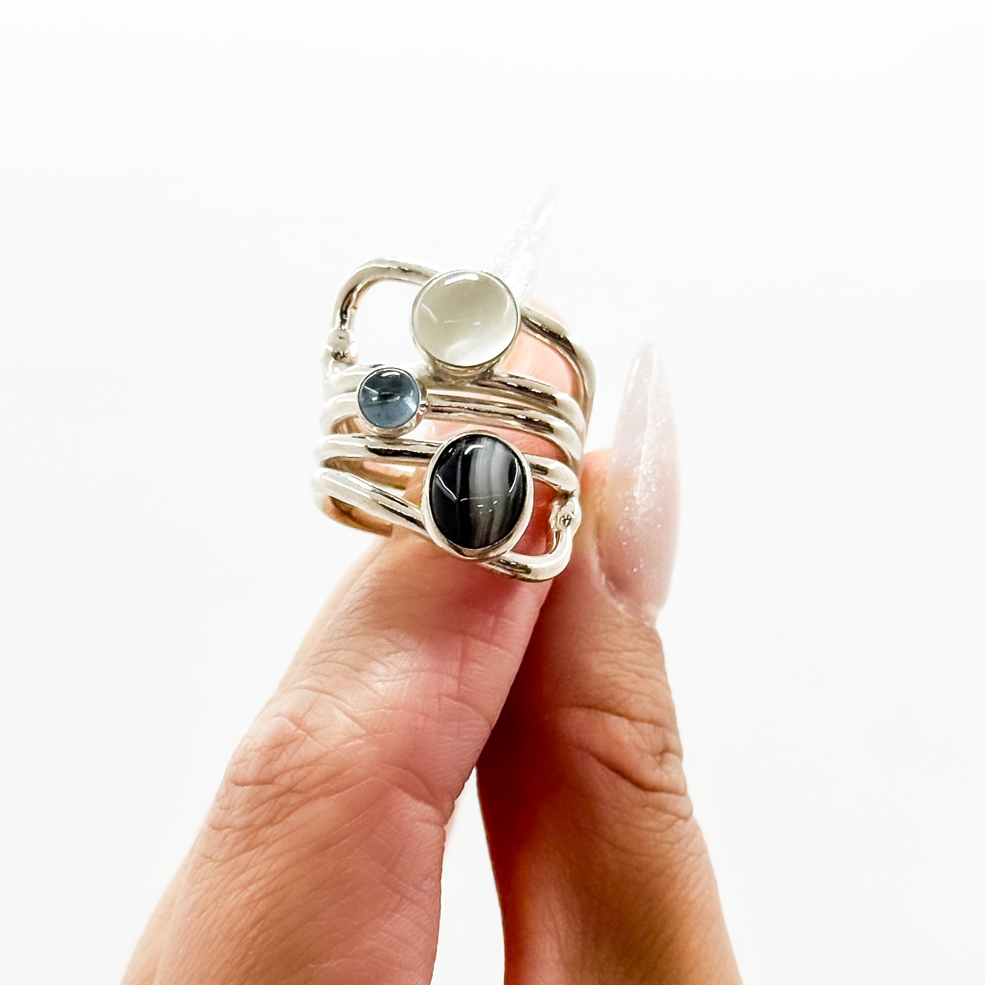 Wrap ring with black & white striped agate, blue topaz & moonstone