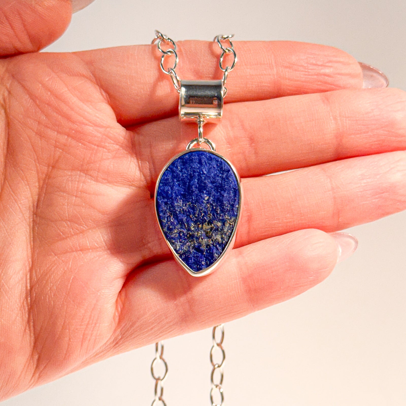 Sterling Silver natural surface pear shape lapis pendant