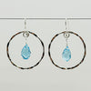 Hoop earrings with topaz drop