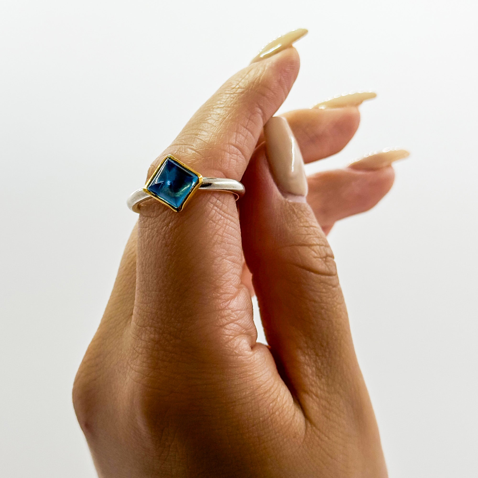 Deanna Ring with Swiss blue Topaz