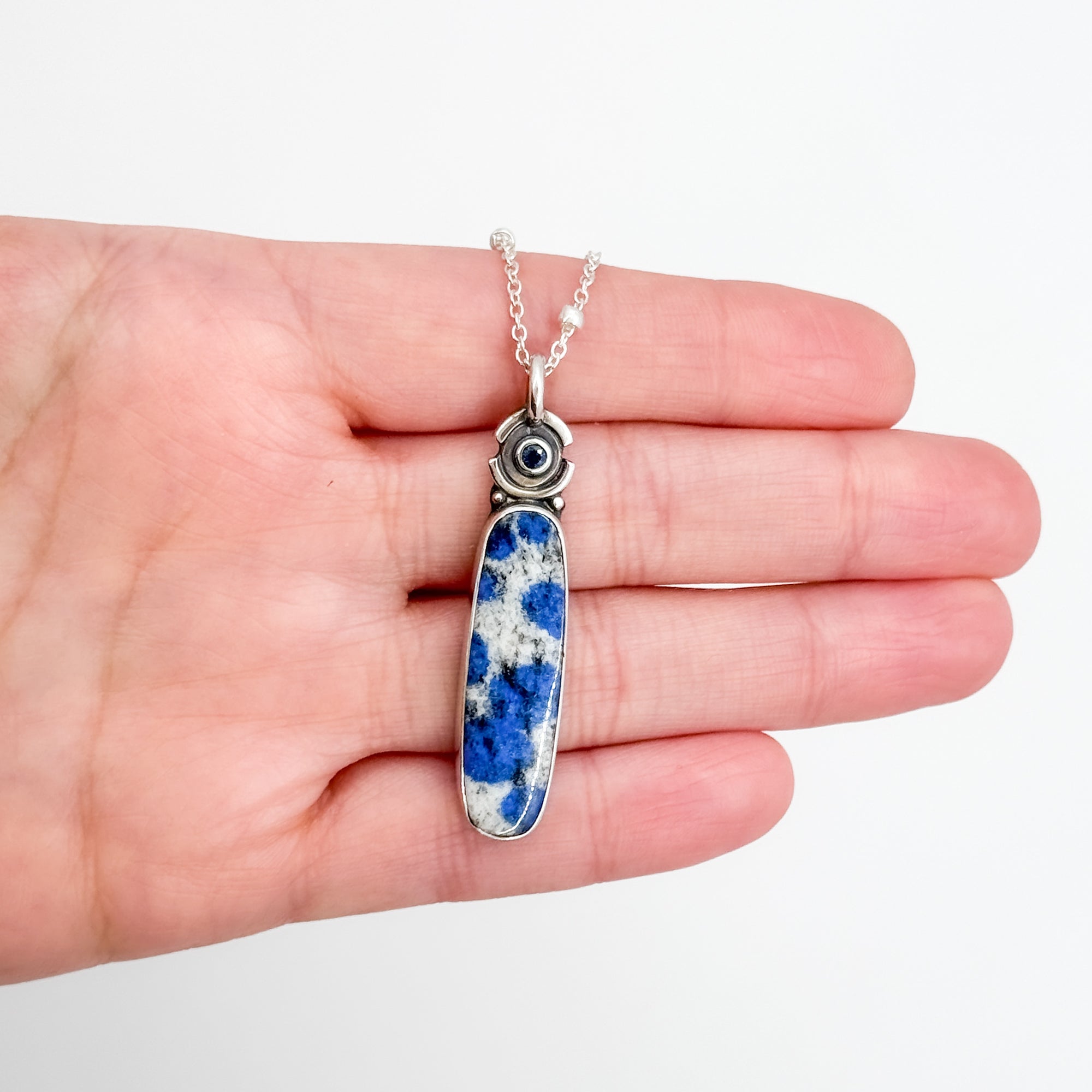 Azurite in granite with blue saphire necklace