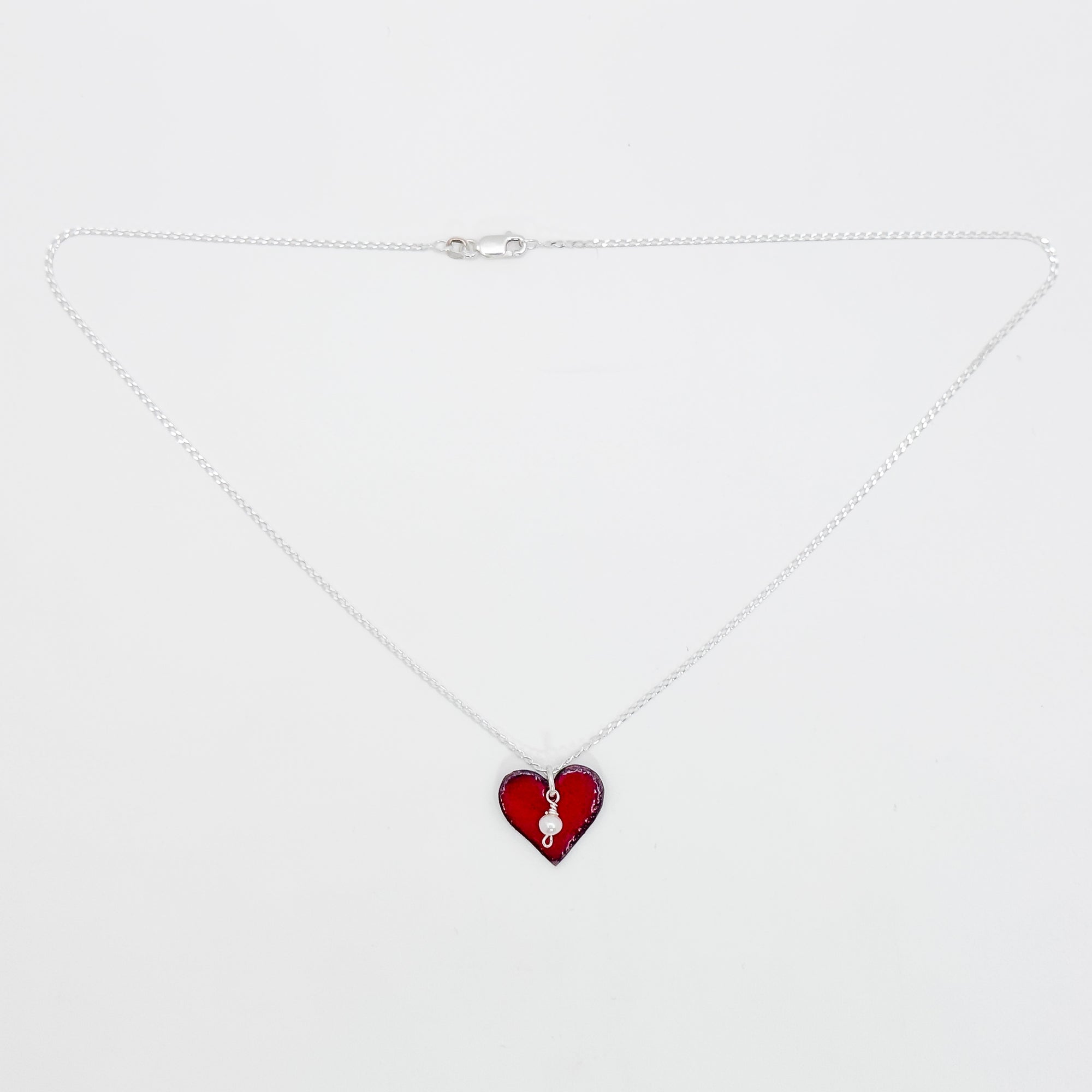 Enamel copper heart pendant on pearl chain necklace