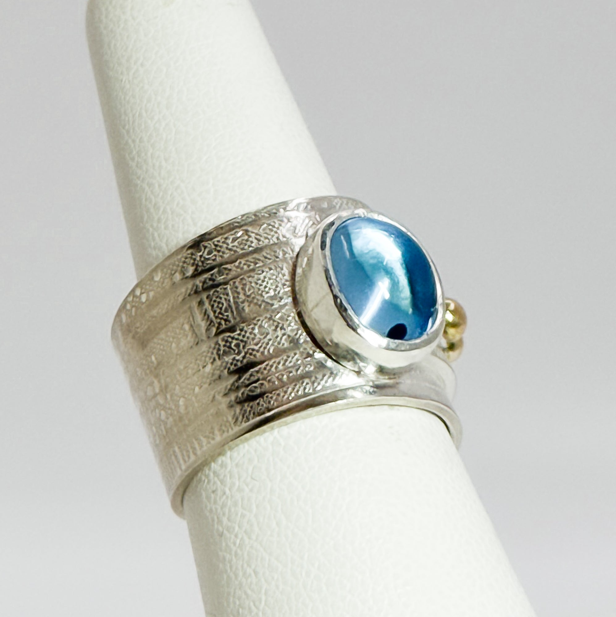 Turkish delight ring with swiss blue topaz