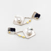 Pearl Power white button post earrings