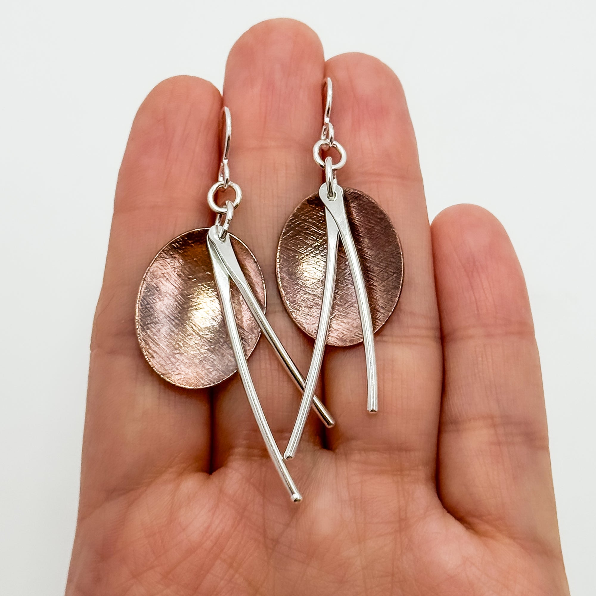 Copper ovals with silver long dangles