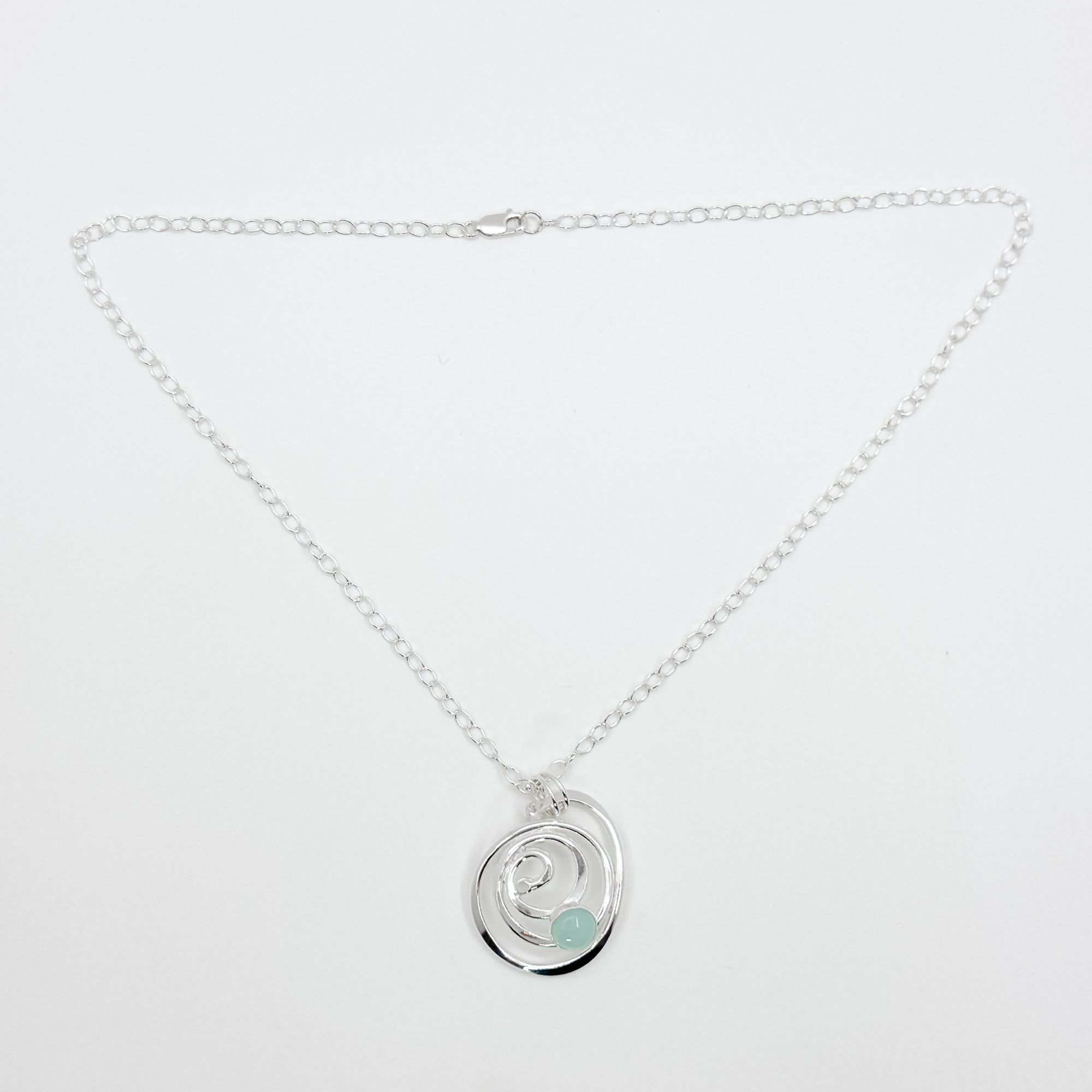 Domed spiral pendant with chalcedony