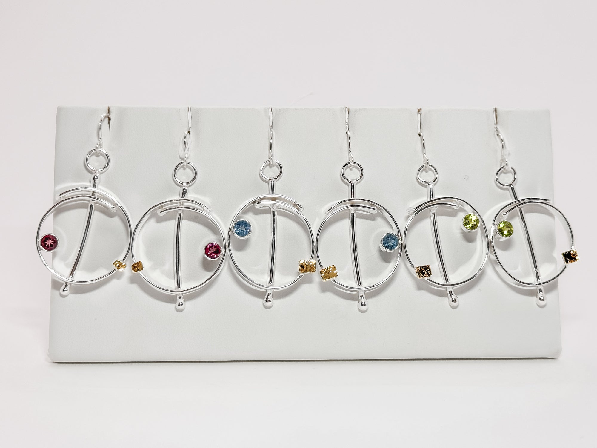 Saturn overlap earrings